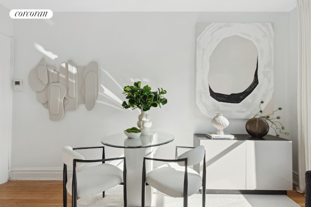 dining room with light wood-type flooring