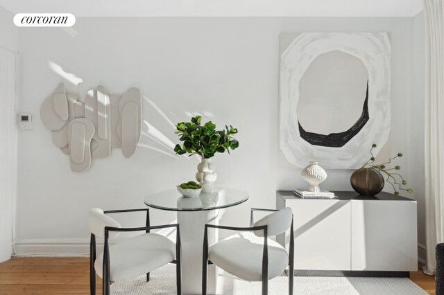 dining room featuring light hardwood / wood-style floors