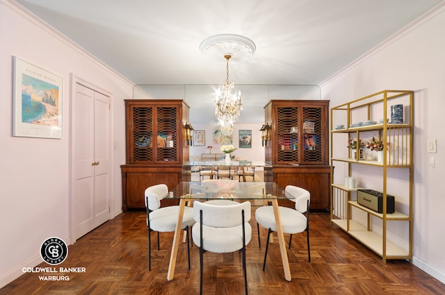 dining area with crown molding, dark parquet flooring, and a notable chandelier