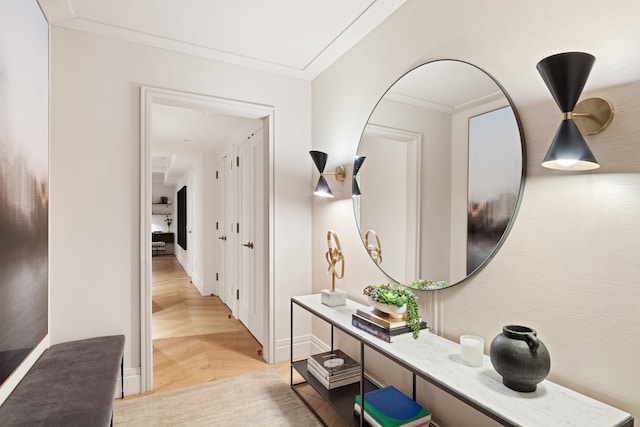 corridor featuring crown molding and baseboards