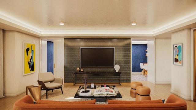living room with wood finished floors and baseboards