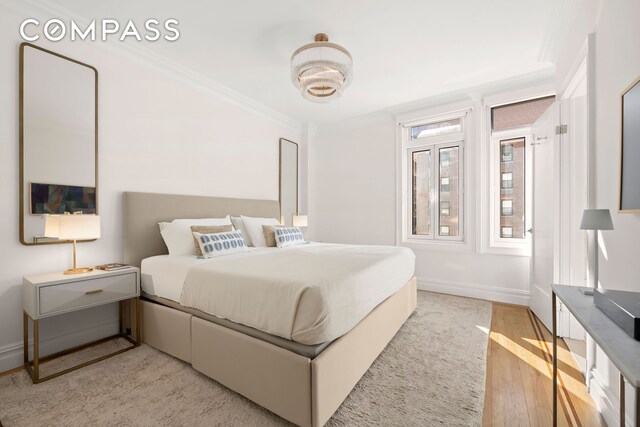 bedroom featuring ornamental molding