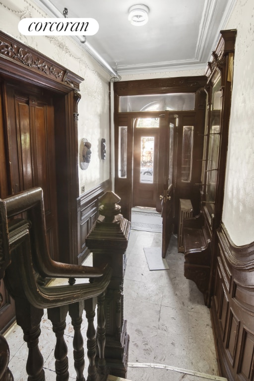 interior space featuring crown molding