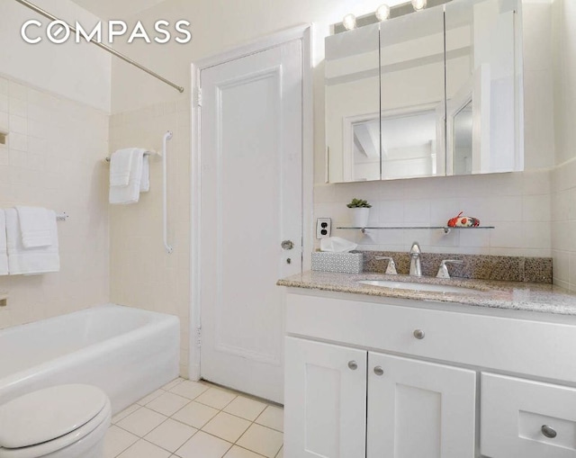 full bathroom featuring tub / shower combination, tile patterned flooring, vanity, decorative backsplash, and toilet