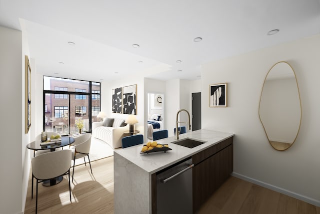 kitchen featuring sink, floor to ceiling windows, stainless steel dishwasher, hardwood / wood-style flooring, and dark brown cabinetry