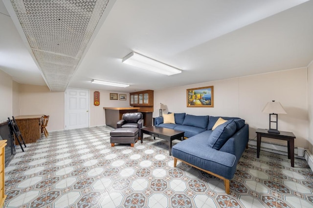 living room with a baseboard heating unit