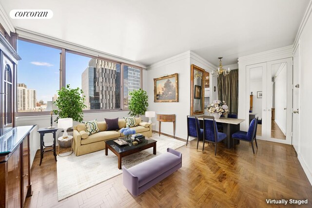 living room featuring an inviting chandelier, parquet flooring, and crown molding