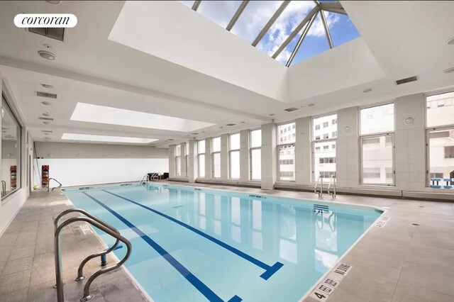 pool featuring a skylight