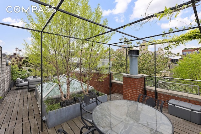 deck featuring outdoor lounge area