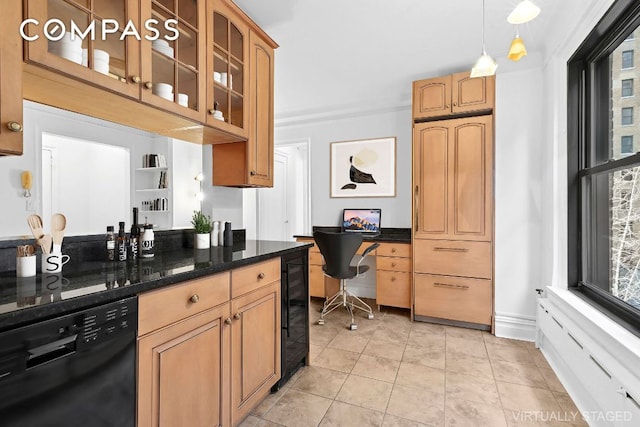 kitchen featuring built in desk, hanging light fixtures, dark stone countertops, black dishwasher, and beverage cooler