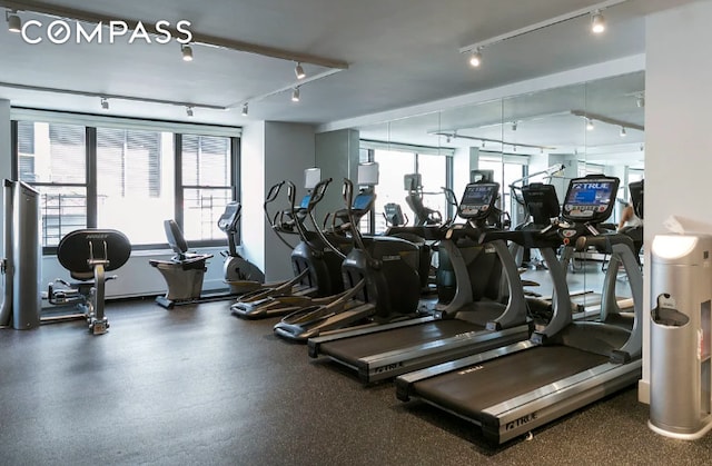 117 E 57th St Unit 35D, New York City, NY 10022 - workout area featuring track lighting