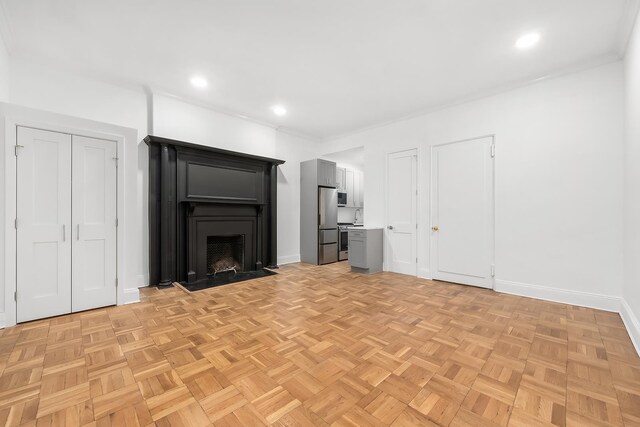 unfurnished living room with light parquet floors