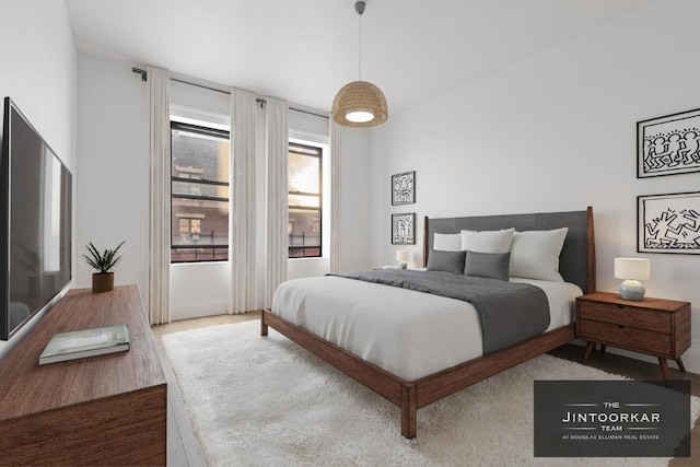 bedroom with light hardwood / wood-style floors