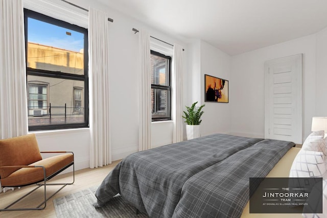 bedroom featuring light hardwood / wood-style flooring