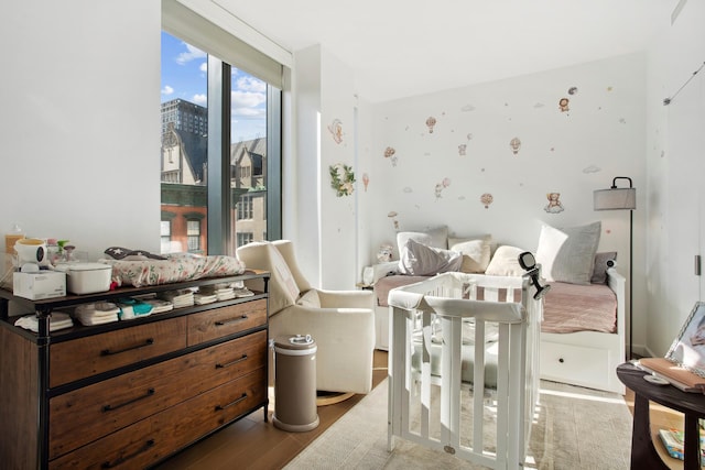 150 Rivington St Unit 5F, New York City, NY 10002 - bedroom with wood finished floors