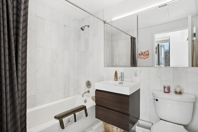 bathroom featuring tile walls, vanity, toilet, and shower / bathtub combination with curtain