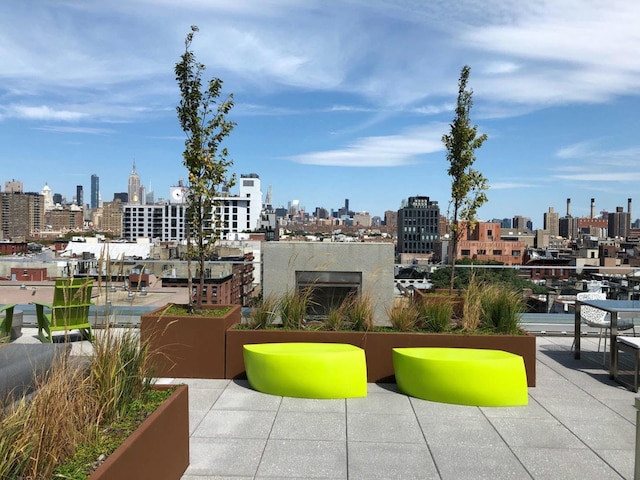 exterior space with a patio area and a city view