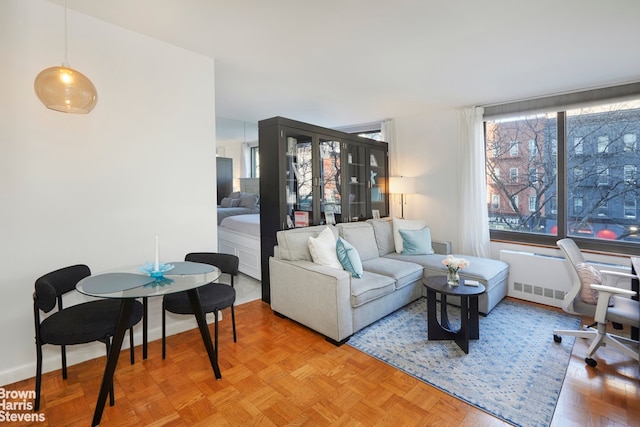 living room featuring light parquet floors