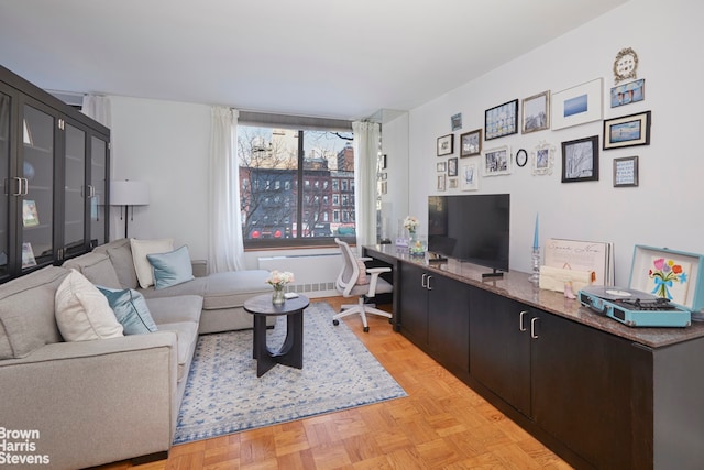 living room featuring light parquet flooring