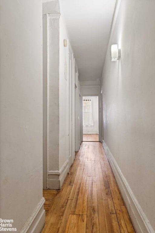 hallway featuring light hardwood / wood-style floors