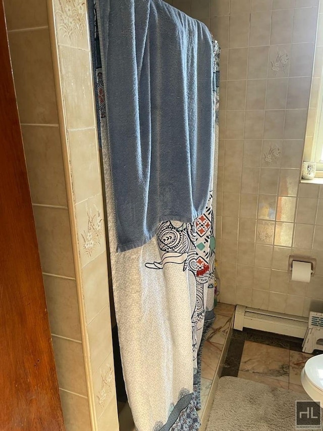 664 Osborn St Unit 1, New York City, NY 11212 - bathroom with toilet, a shower with curtain, tile walls, and tile patterned floors