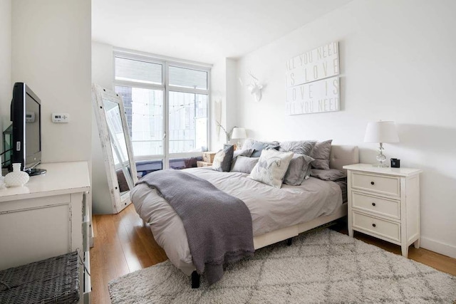 bedroom featuring light hardwood / wood-style flooring