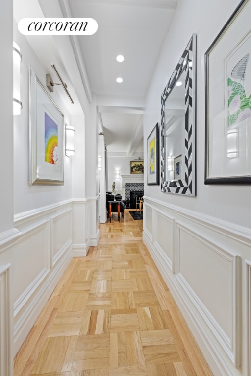 corridor featuring light parquet flooring