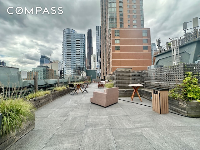 view of patio featuring a skyline view