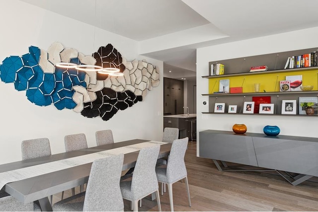 dining space featuring hardwood / wood-style flooring