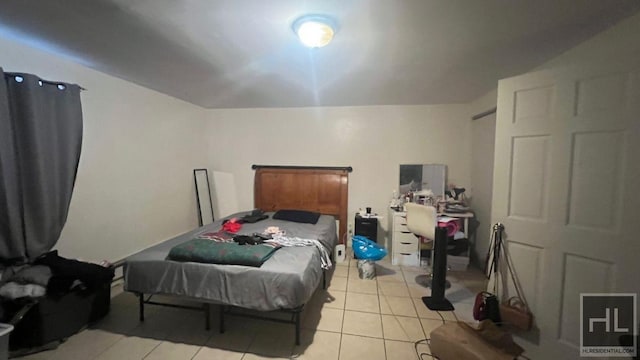 1271 Rogers Ave Unit 1, New York City, NY 11226 - bedroom with light tile patterned floors