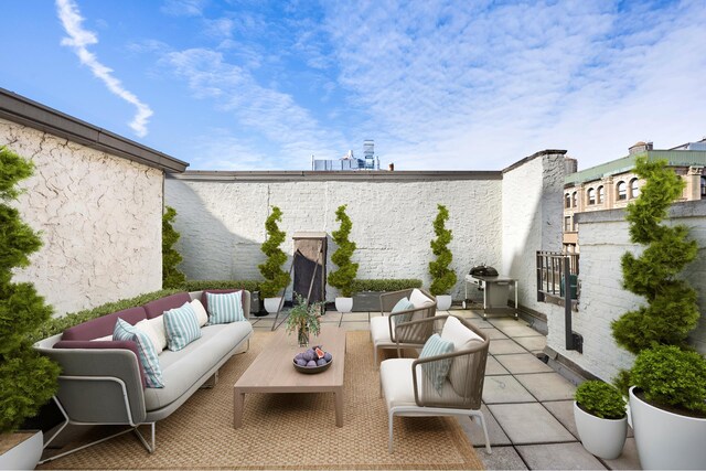 view of patio / terrace with grilling area and outdoor lounge area