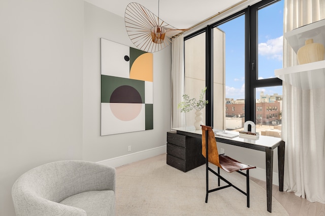 office area with carpet floors and baseboards