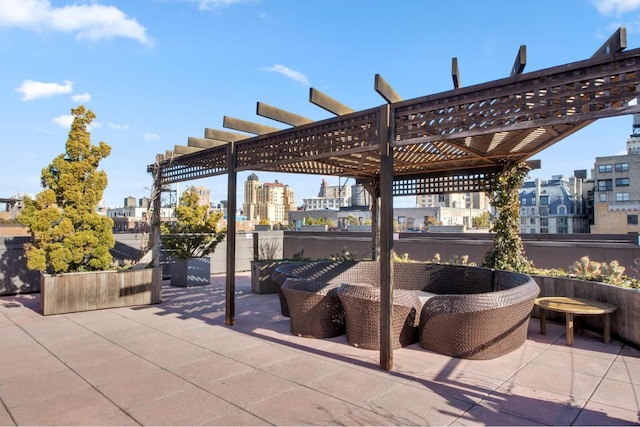 view of patio / terrace with an outdoor hangout area and a pergola