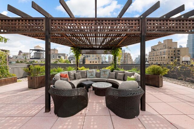 view of patio with a pergola and an outdoor hangout area