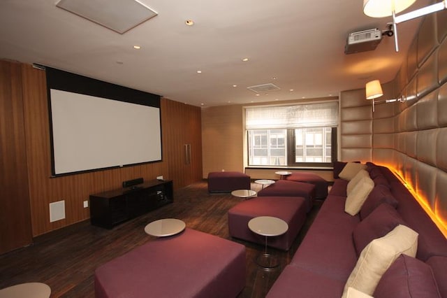 home theater room featuring recessed lighting and wood finished floors