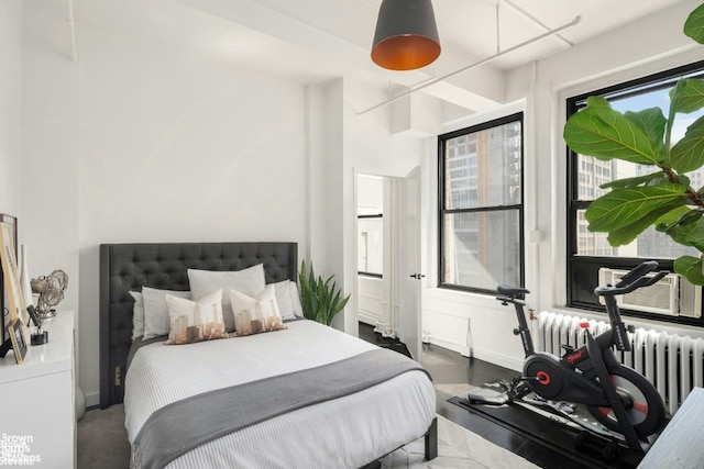 bedroom with cooling unit and radiator