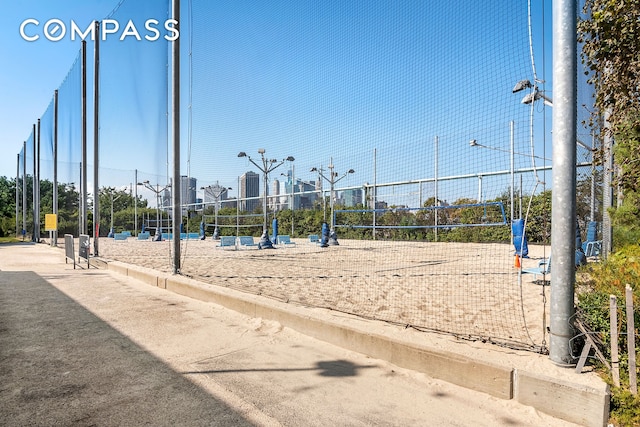 view of jungle gym with volleyball court