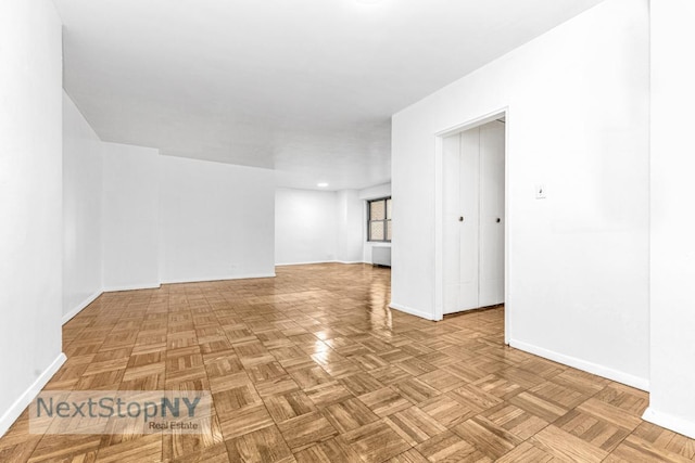 empty room featuring light parquet flooring