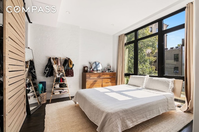 bedroom featuring dark wood-type flooring