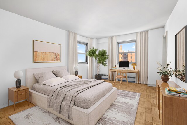 bedroom featuring light parquet floors