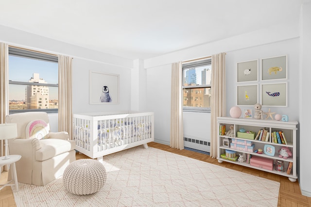 bedroom with a nursery area