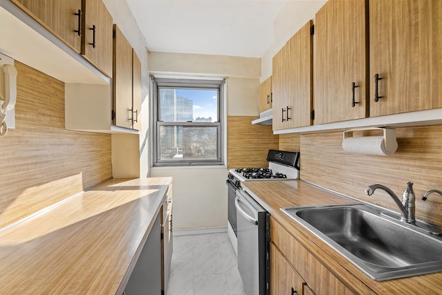 215 Adams St Unit 15G, New York City, NY 11201 - kitchen with dishwasher, light countertops, gas range gas stove, light marble finish flooring, and tasteful backsplash