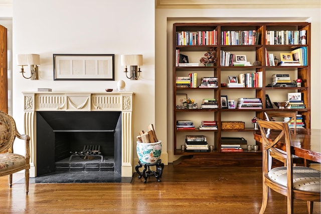 925 Park Ave Unit 2A, New York City, NY 10075 - sitting room featuring wood finished floors and a fireplace with flush hearth