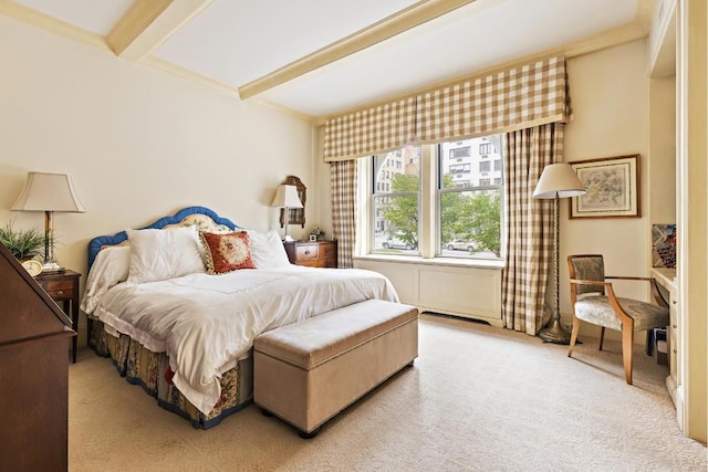 bedroom featuring beam ceiling and light carpet