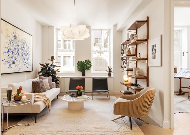 sitting room with light hardwood / wood-style floors