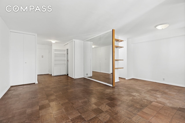 basement featuring baseboards