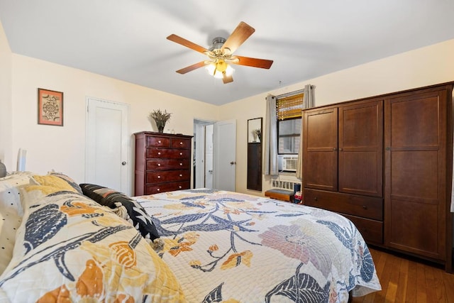 bedroom featuring dark hardwood / wood-style floors and ceiling fan