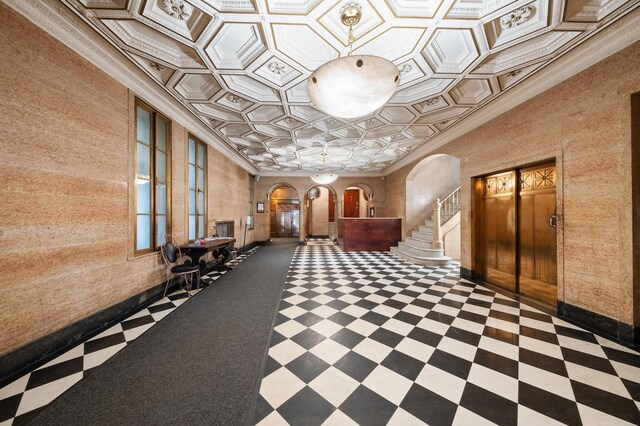 416 Ocean Ave Unit 15, New York City, NY 11226 - lobby featuring ornamental molding and stairway