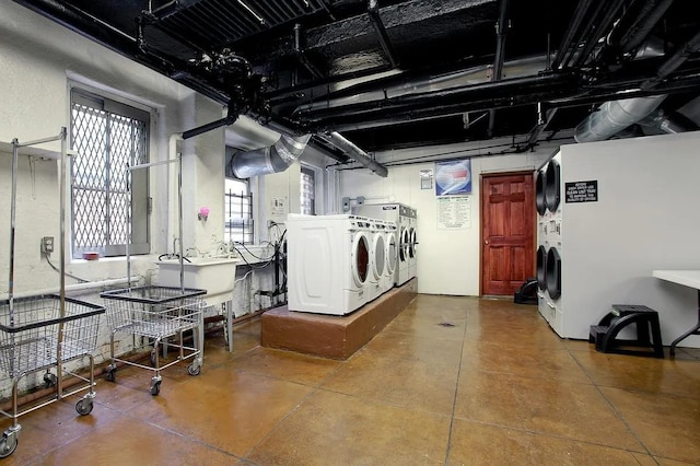 416 Ocean Ave Unit 15, New York City, NY 11226 - laundry area with washer and clothes dryer