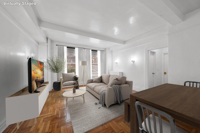 living room featuring parquet flooring and beam ceiling